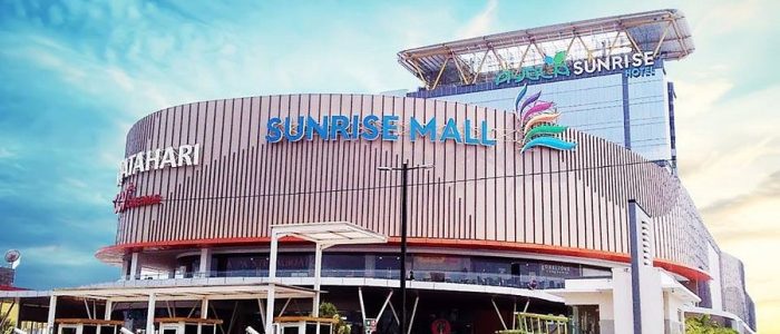 Sunrise Mall: impresionante foto del amanecer sobre el centro comercial con luces y arquitectura moderna